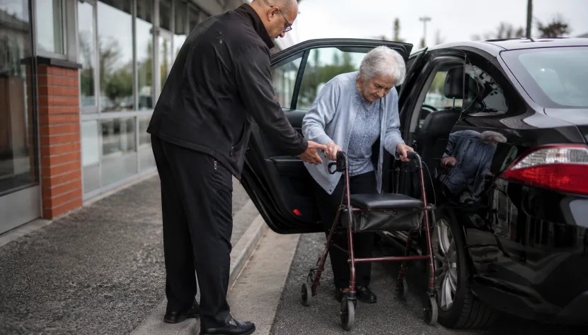 Taxi Christchurch – King Cabs 12 Wheelchair user boarding an accessible taxi using rear wheelchair ramp