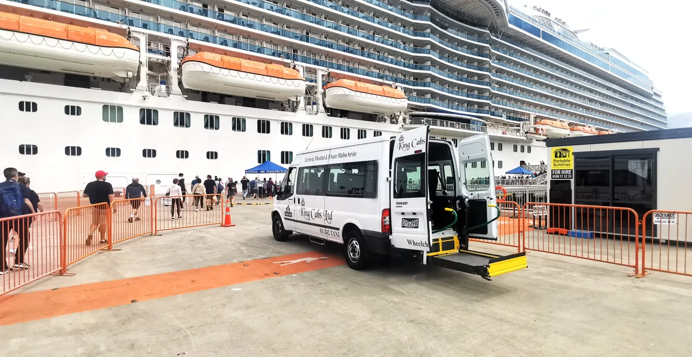 Taxi Christchurch – King Cabs 13 Real King Cabs wheelchair accessible minibus with the rear passenger lift lowered at Lyttelton cruise terminal